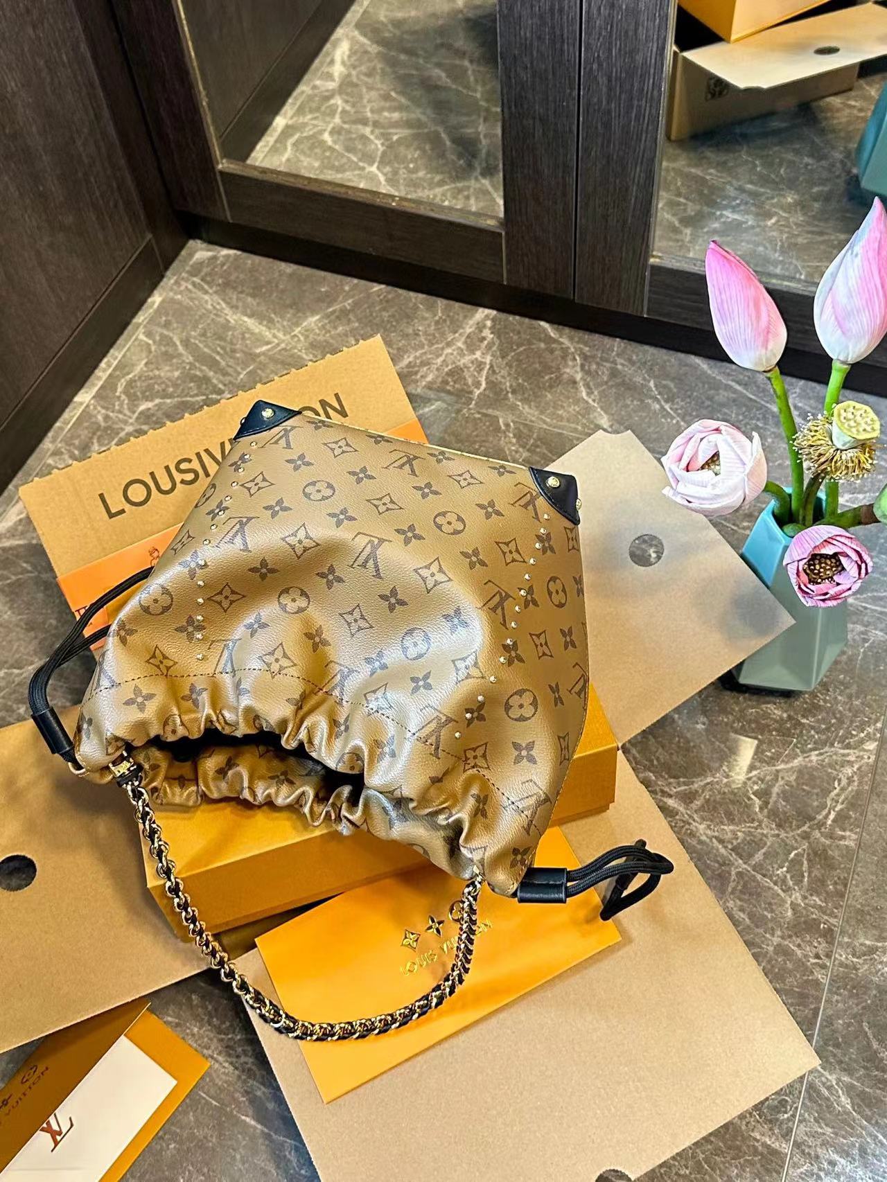 LV チェーンバケットバッグ【50％割引+送料無料】