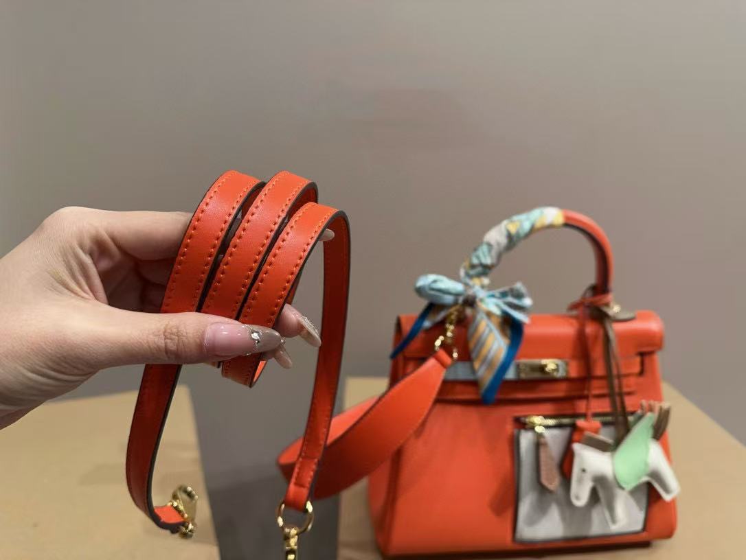 HERME5 kellyオレンジ色のハンドバッグ【50％割引+送料無料】