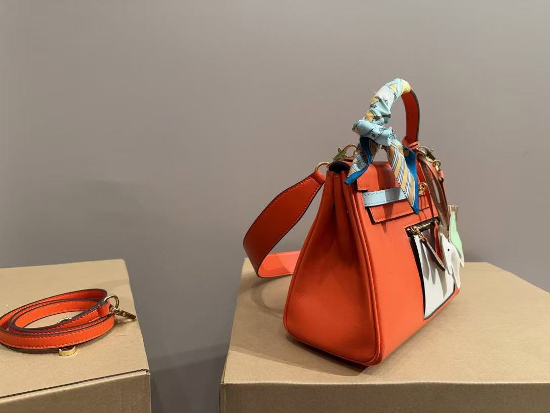 HERME5 kellyオレンジ色のハンドバッグ【50％割引+送料無料】