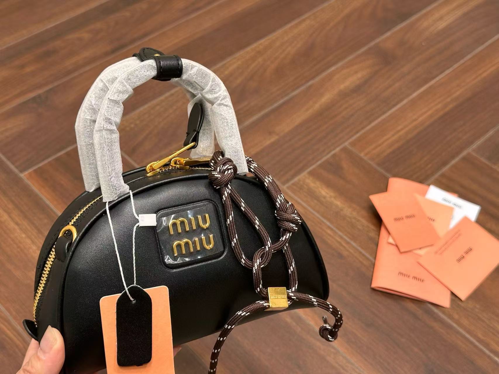 M1UM1U ハーフラウンドトートバッグ【50％割引+送料無料】