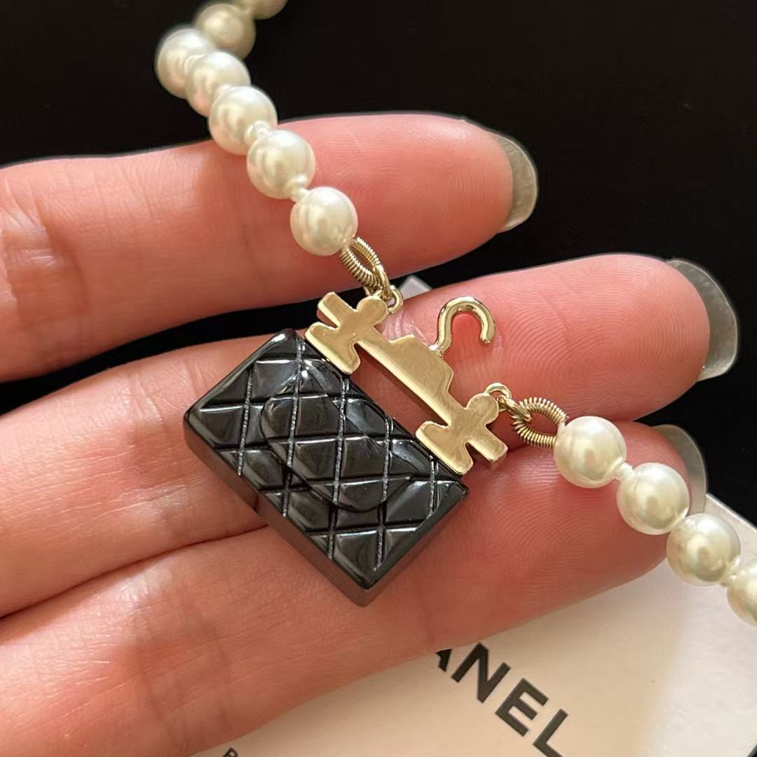 CHANE1 パールバッグネックレス【 50％割引+送料無料】