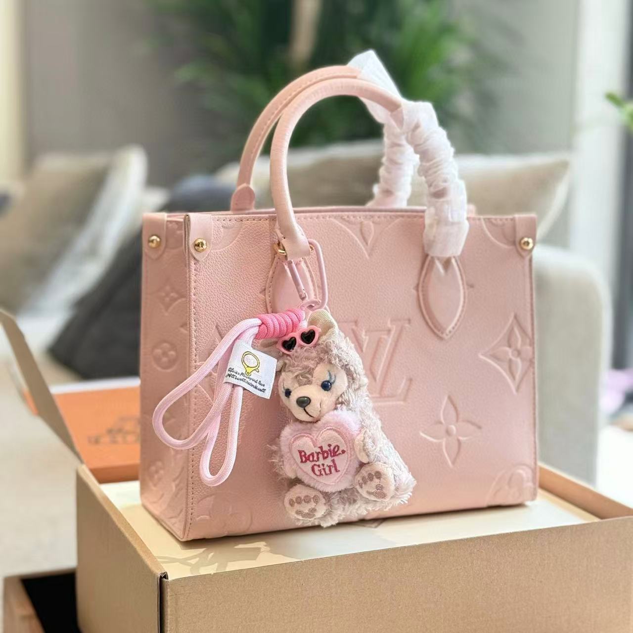 LV onthegoピンクのハンドバッグ【 50％割引+送料無料】