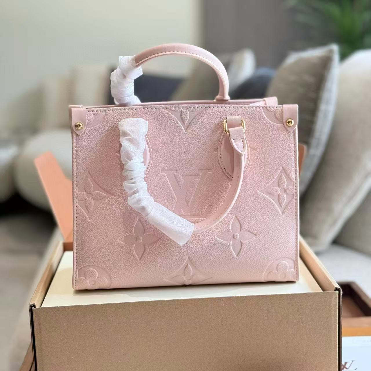 LV onthegoピンクのハンドバッグ【 50％割引+送料無料】