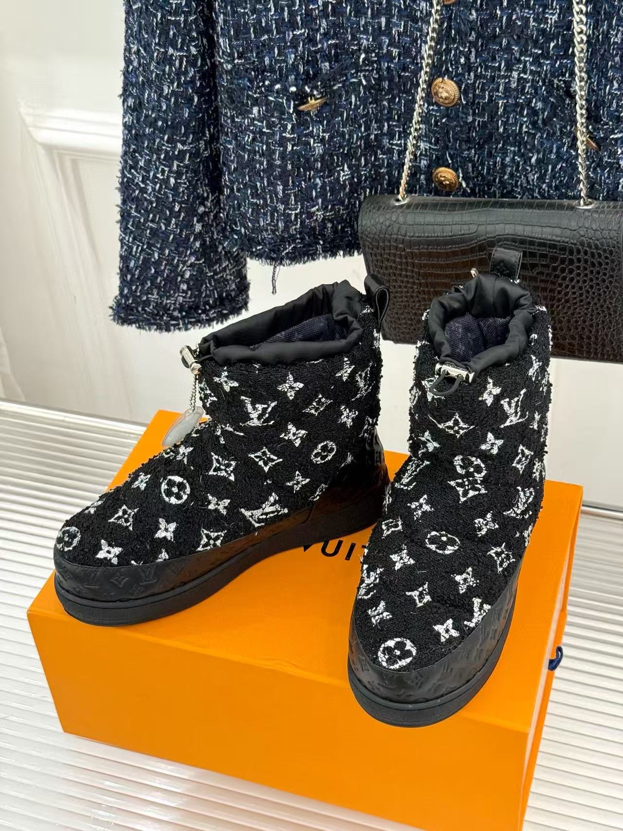 LVの高品質プリントダウンスノーブーツ【50％割引+送料無料】