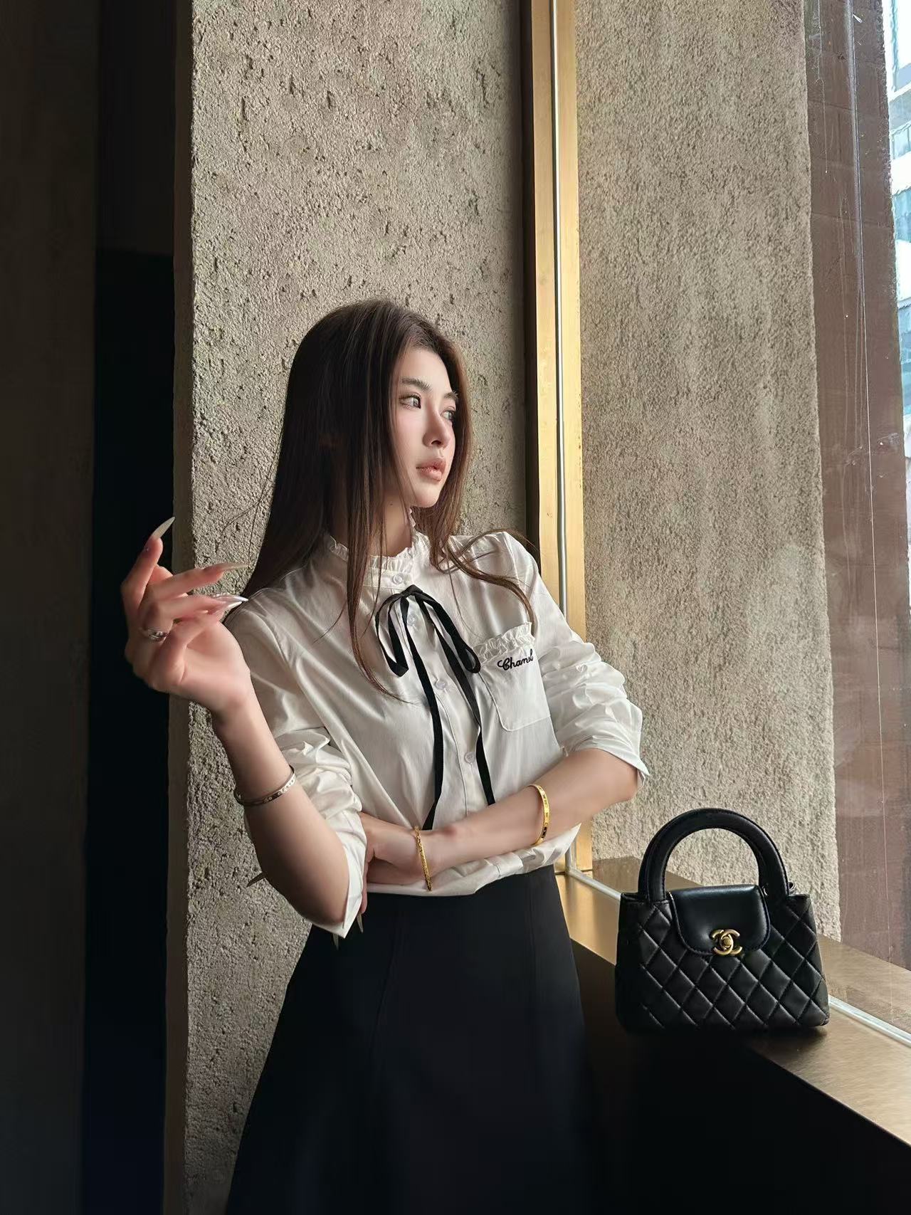 M1UM1U フリル付きシャツ【50％割引+送料無料】