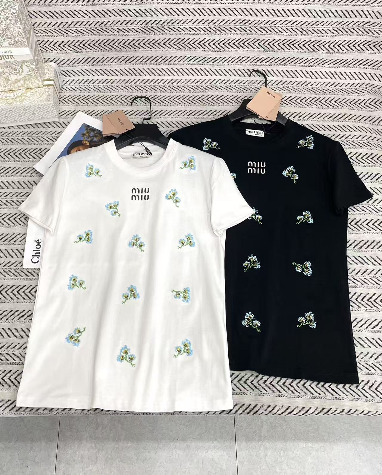 M1UM1U プリントTシャツ【50％割引+送料無料】