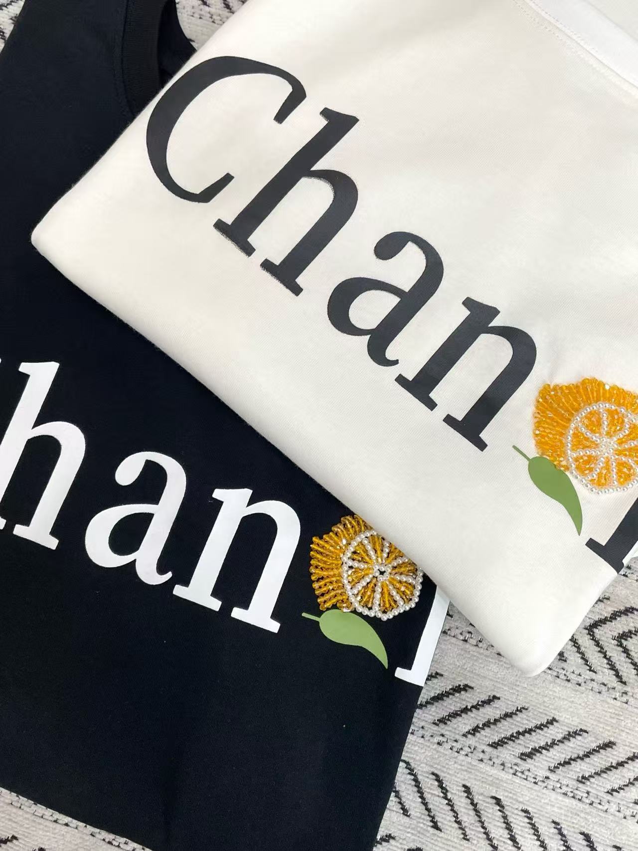 CHANE1 オレンジレターTシャツ【50％割引+送料無料】