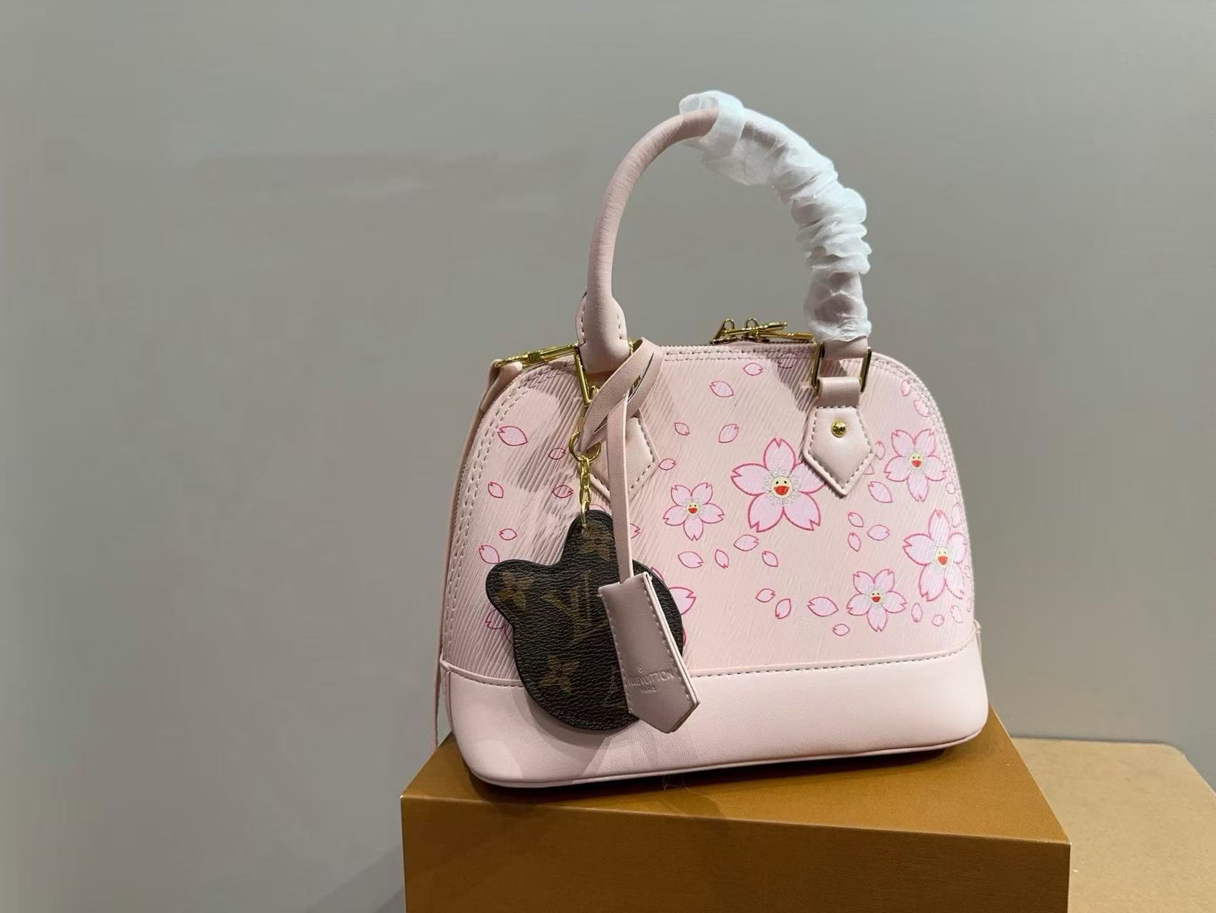 LV AImaピンクの桜柄ハンドバッグ【50％割引+送料無料】
