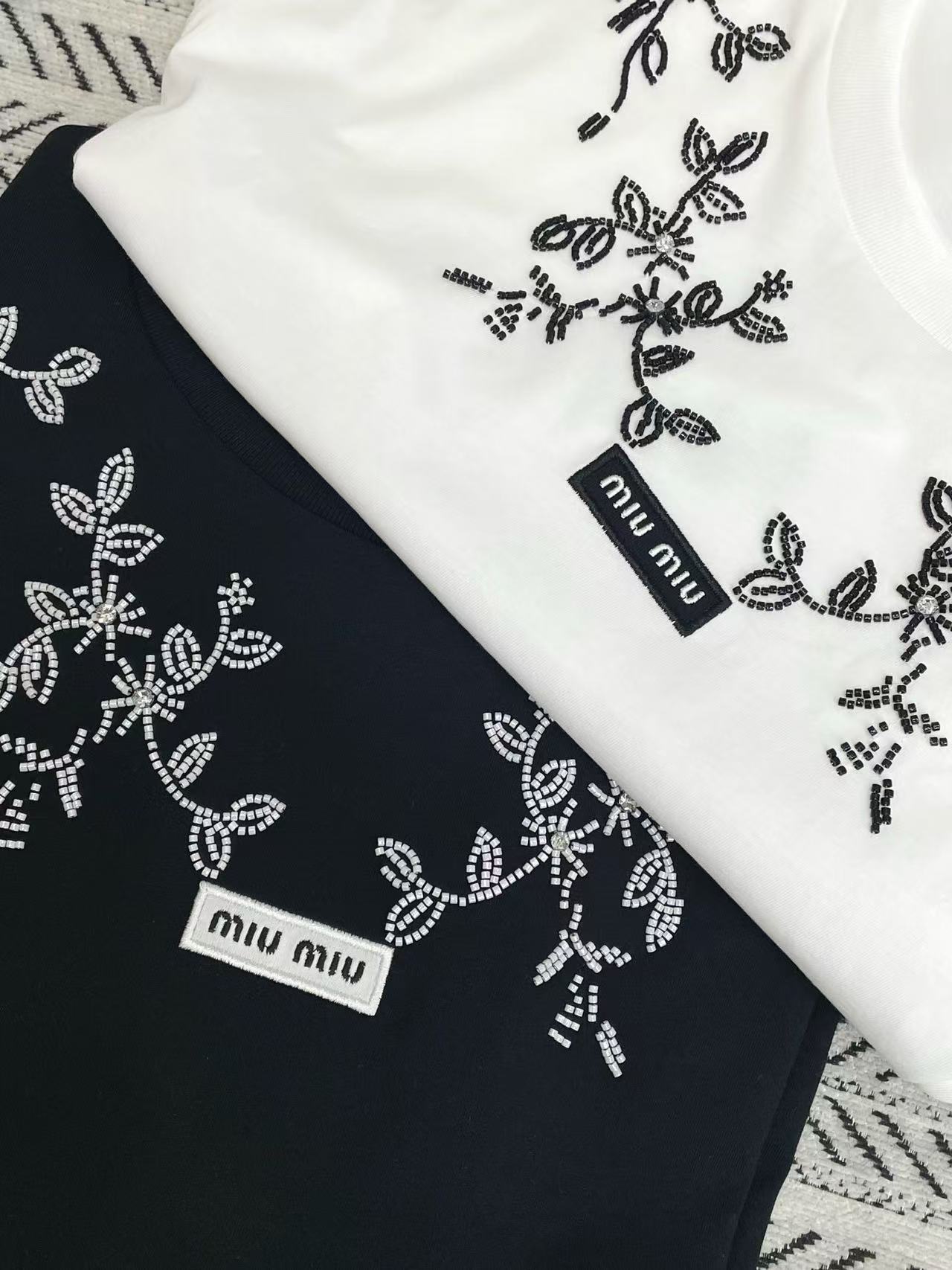 M1UM1U プリント長袖Tシャツ【50％割引+送料無料】