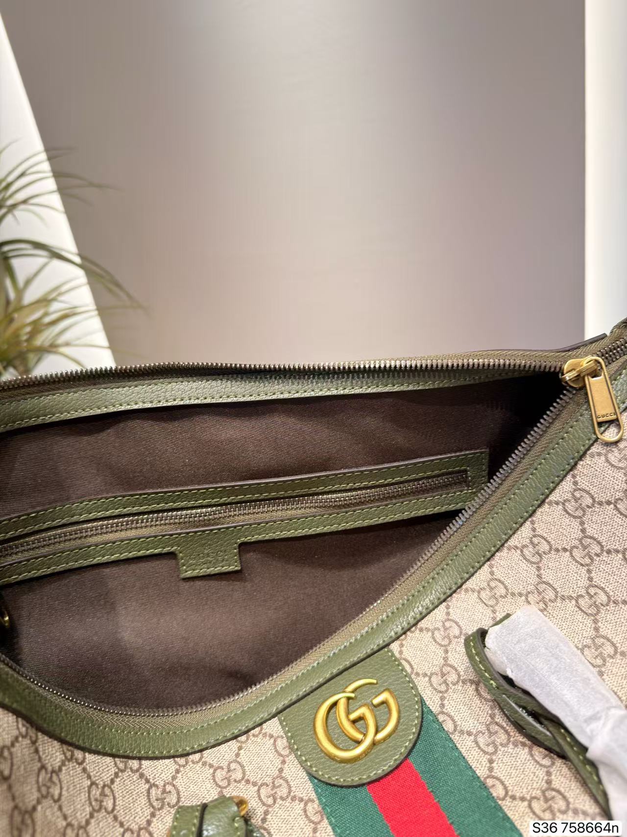 GUCCI プリント入りトラベルバッグ【50％割引+送料無料】