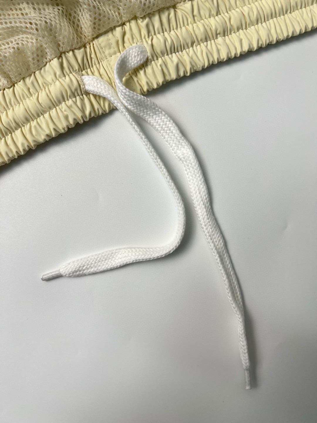 Balenciaga 巴黎世家 SS23 纯色松紧腰字母logo运动裤 休闲裤 长裤 男款 米白色 746510TOO489000