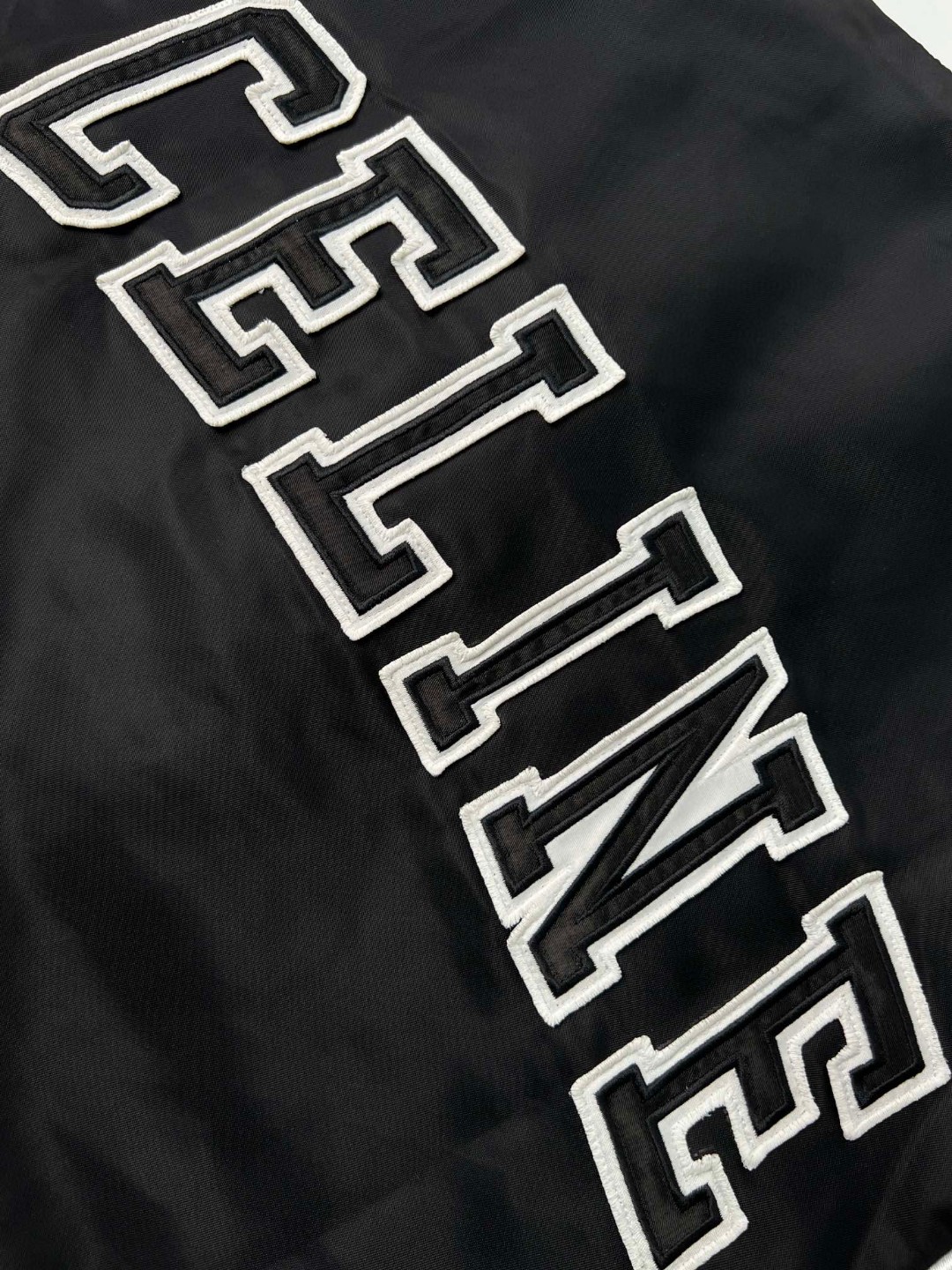 CELINE 赛琳 拼色字母印花飞行员夹克 棒球服 外套 秋冬款 男女同款 黑色 2W867532T-38NO