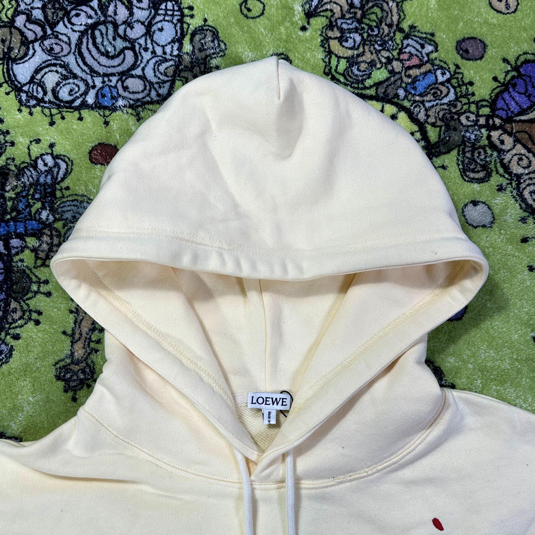 Loewe 罗意威 哈尔的移动城堡 联名款 小火焰刺绣拼皮口袋抽绳连帽卫衣 卫衣 秋冬 米白 HB44Y24X04-2370