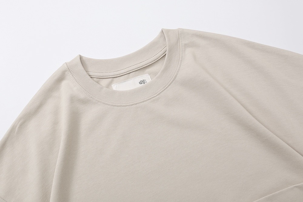 62#MADNESS 十周年限定 纯色贴标T恤 短袖 男女同款 白色 黑色 杏色