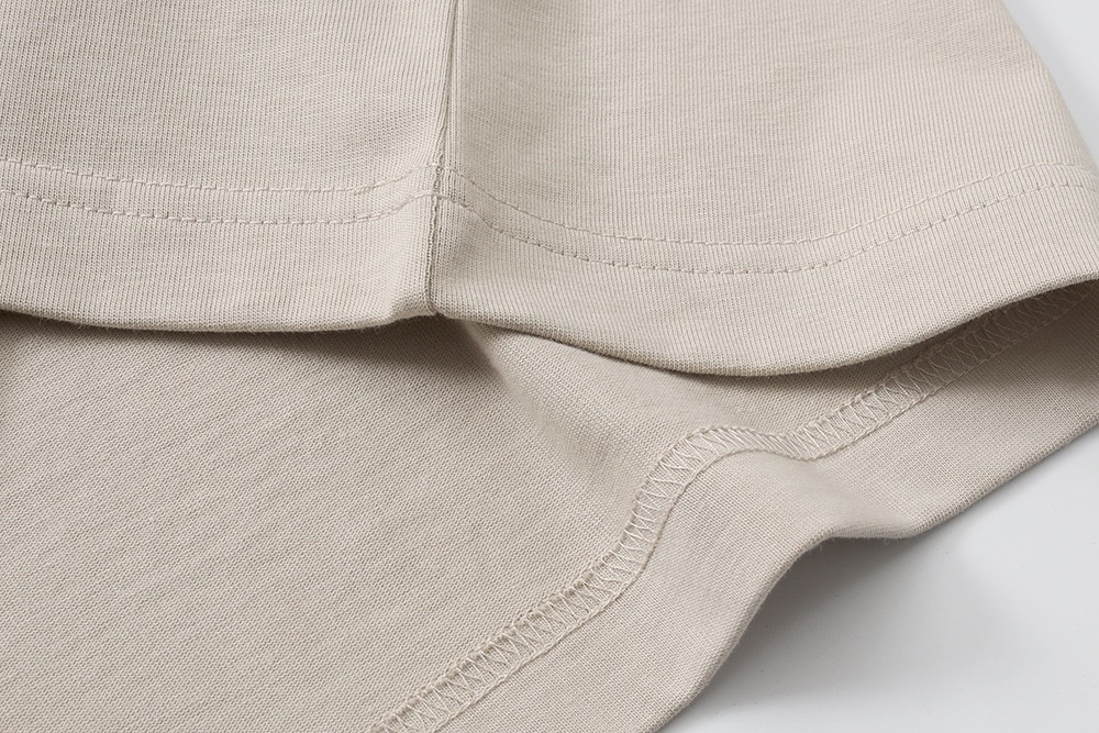 62#MADNESS 十周年限定 纯色贴标T恤 短袖 男女同款 白色 黑色 杏色