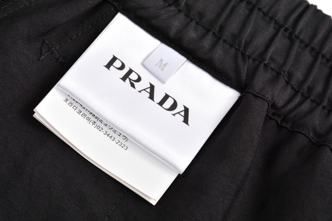 PRADA 普拉达 纯色丝质字母logo印花休闲裤 运动裤 裤子 短裤 黑色 