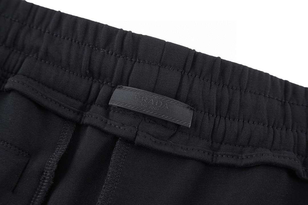 PRADA 普拉达 纯色拼接尼龙大口袋 休闲裤 裤子 长裤 黑色 