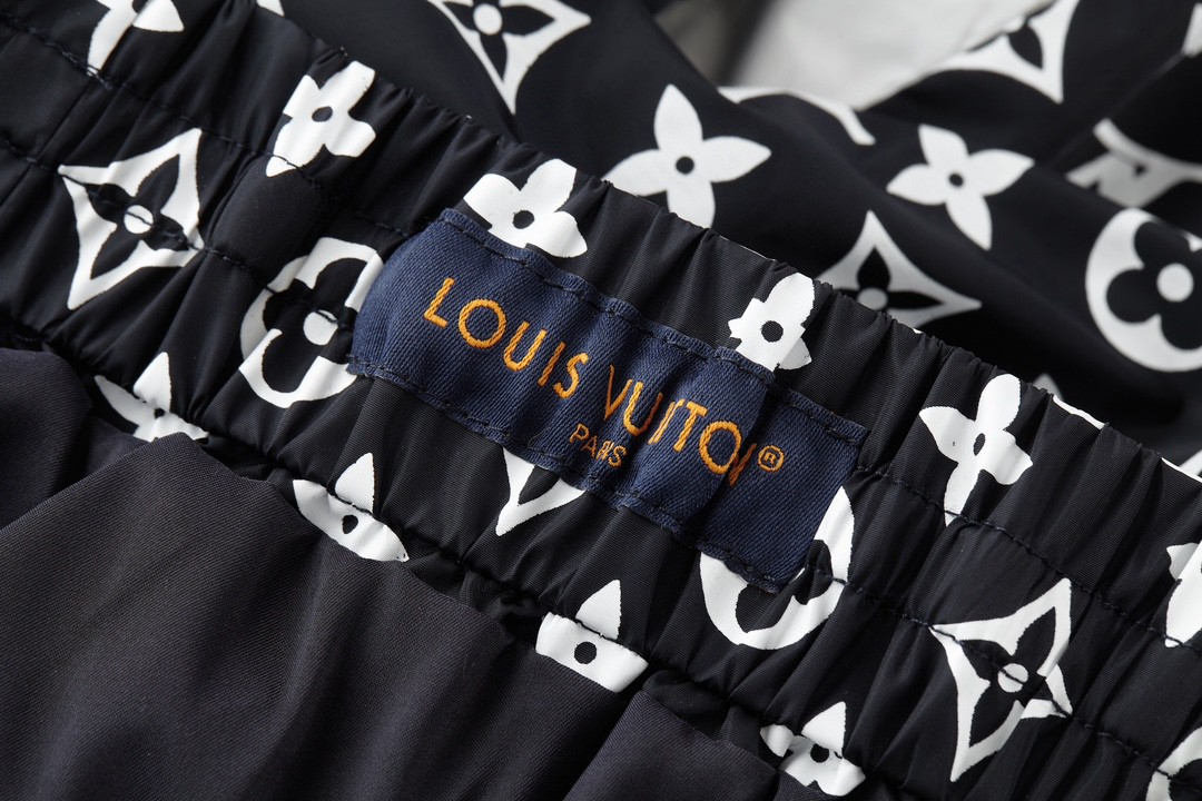LOUIS VUITTON 拼接logo满印束脚运动裤 休闲裤 长裤 裤子 1AFWQD