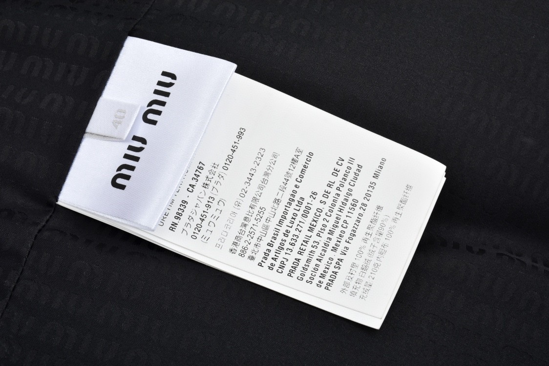 MIU MIU 缪缪 暗纹字母logo满印拉链棉服 夹克 外套 长袖 灰色 黑色