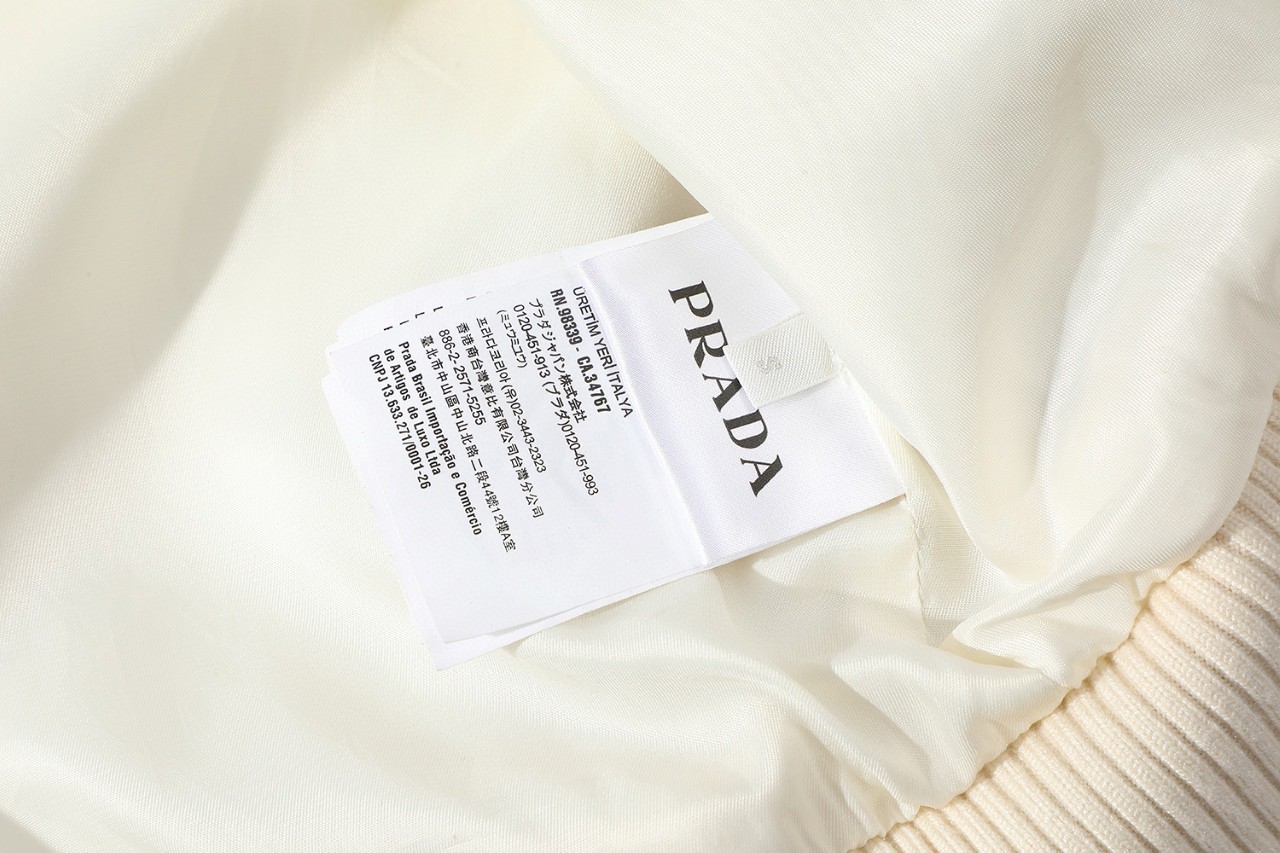 PRADA 普拉达 做旧擦脏字母logo皮衣外套 棒球服 夹克 长袖 象牙白 黑色 UPW518-15Y0-F0304-S-OOO
