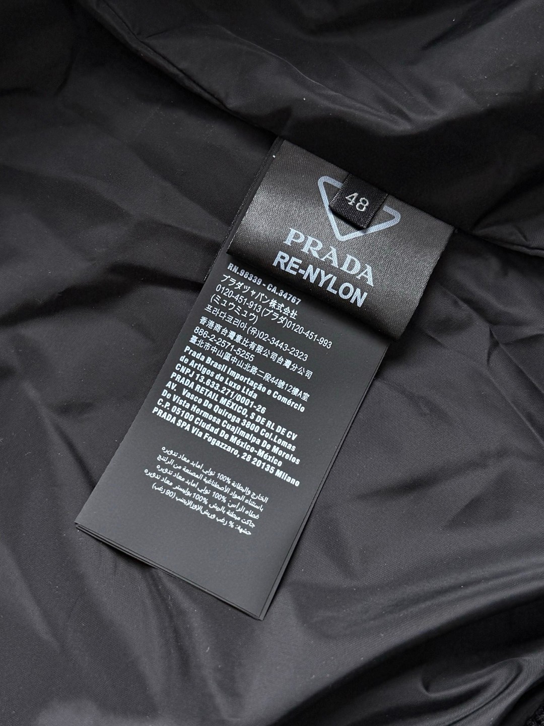 PRADA 普拉达 金属标翻领拼色面包羽绒服 夹克 外套 长袖 黑色 E2 292295-17IB-F0002-S-OOO