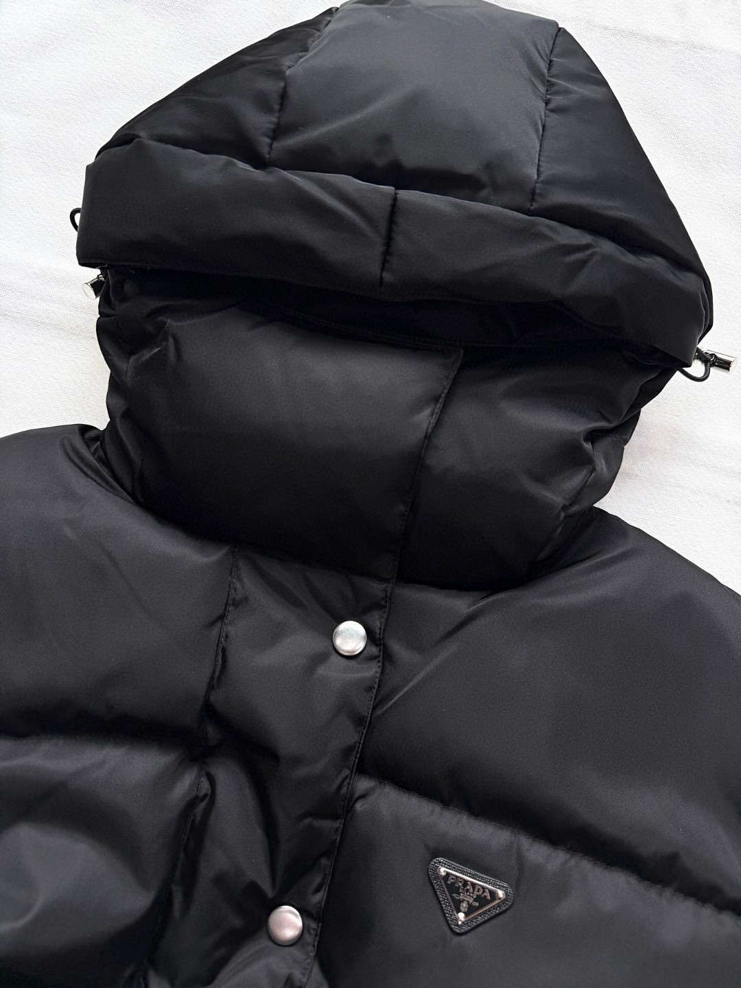 PRADA 普拉达 蚂蚁腰可拆卸腰包连帽收腰羽绒服 夹克 外套 长袖 女款 黑色 G0 29X966-1WQ8-F0002-S-OOO