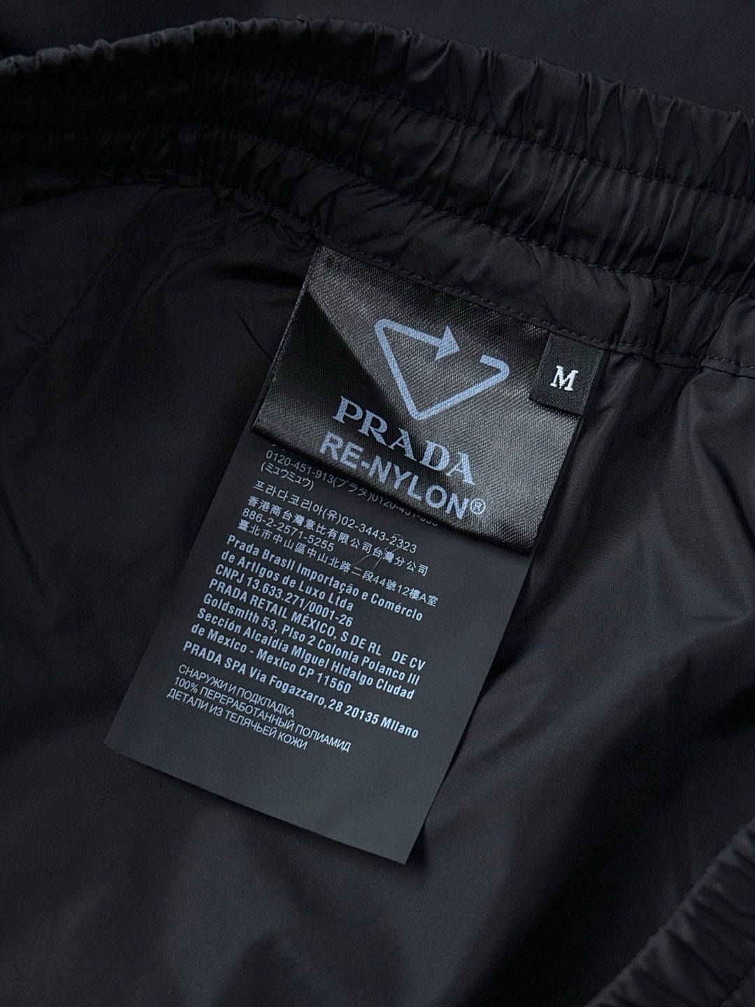 PRADA 普拉达 尼龙三角标休闲裤 运动裤 裤子 长裤 黑灰色 B0 SPH442-1WQ9-F0N5A-S-OOO