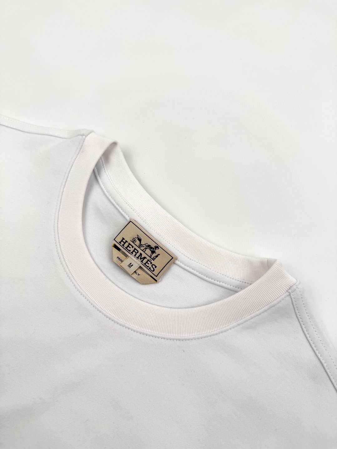 HERMES 爱马仕 皮革图案标识圆领短袖 T恤 夏款 黑色 白色 A0 H657800HA02