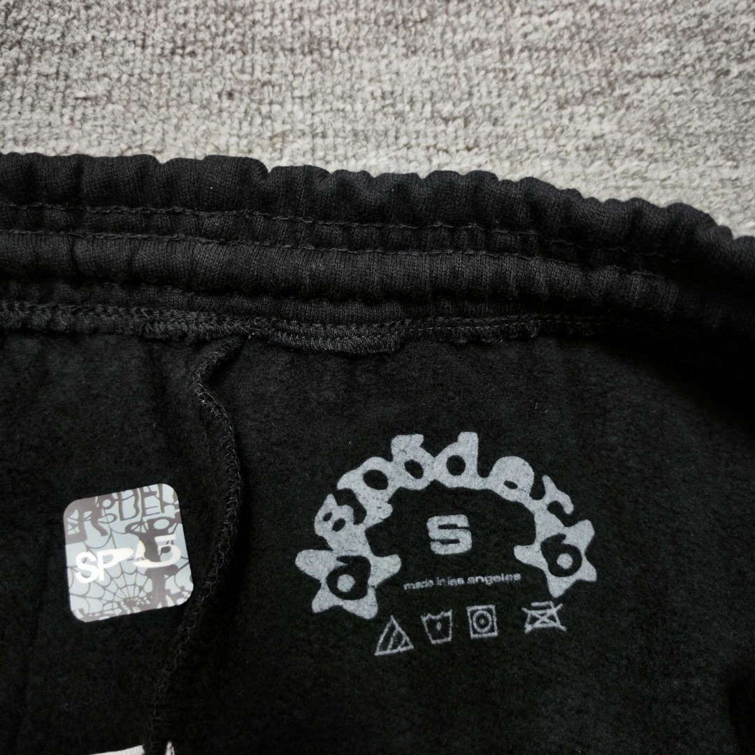 Sp5der 白色Sp5der字母 星星印花 抽绳松紧腰束脚运动裤 休闲裤 长裤 裤子 黑色