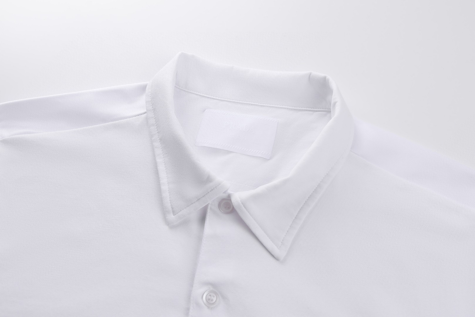 PRADA 普拉达 胸前拉链口袋拼接Polo衫 短袖 T恤 黑色 白色 A0 UJN703-1YED-F0806-S-211