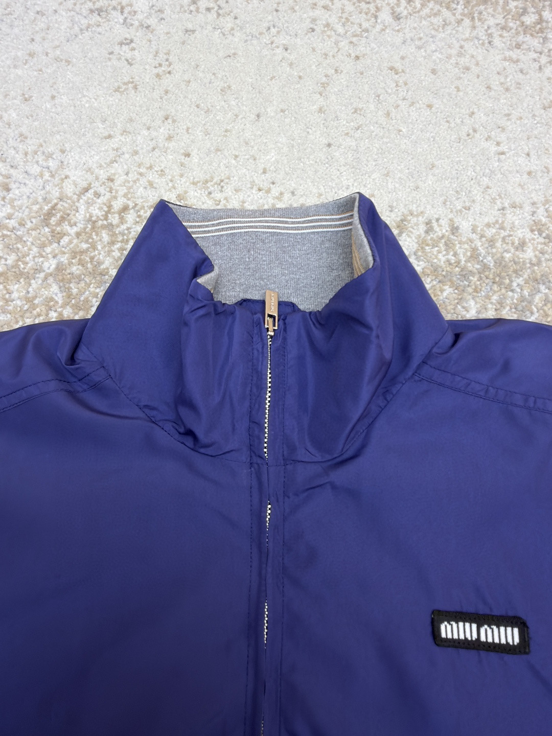 MIU MIU 缪缪 科技府绸束口拉链外套 夹克 长袖 女款 蓝色 B0 ML1461-18VS-F0V41-S-OOO