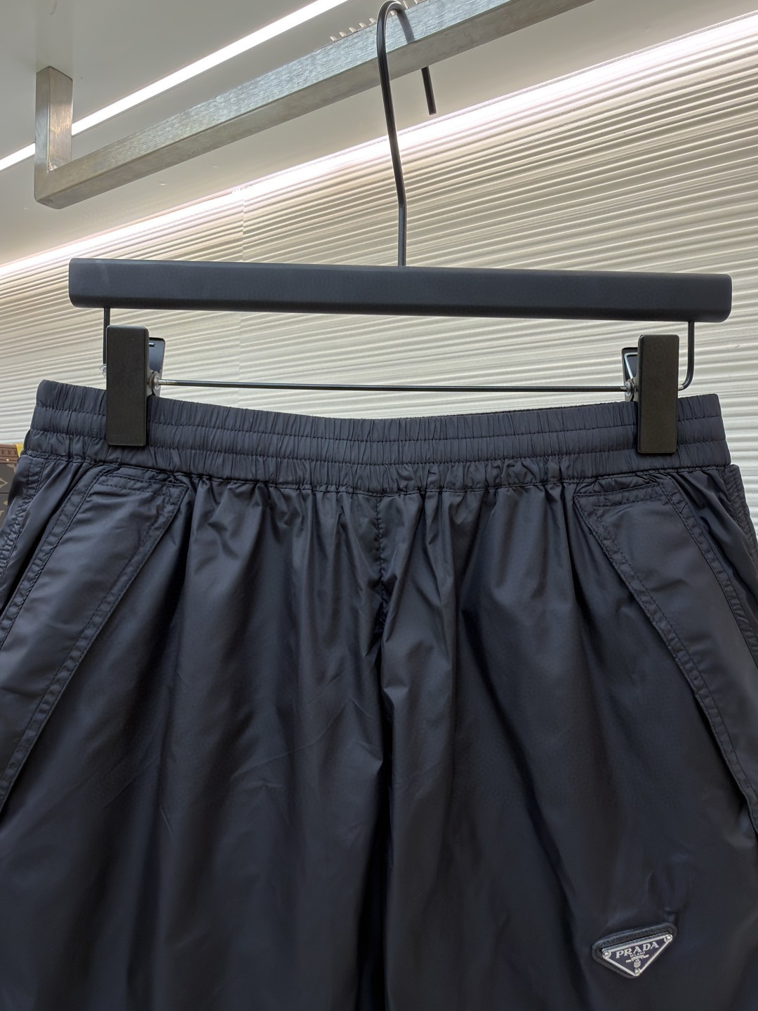 PRADA 普拉达 三角标尼龙松紧腰短裤 休闲裤 裤子 黑色 A5 22X901-1WQ9-F0002-S-WMO