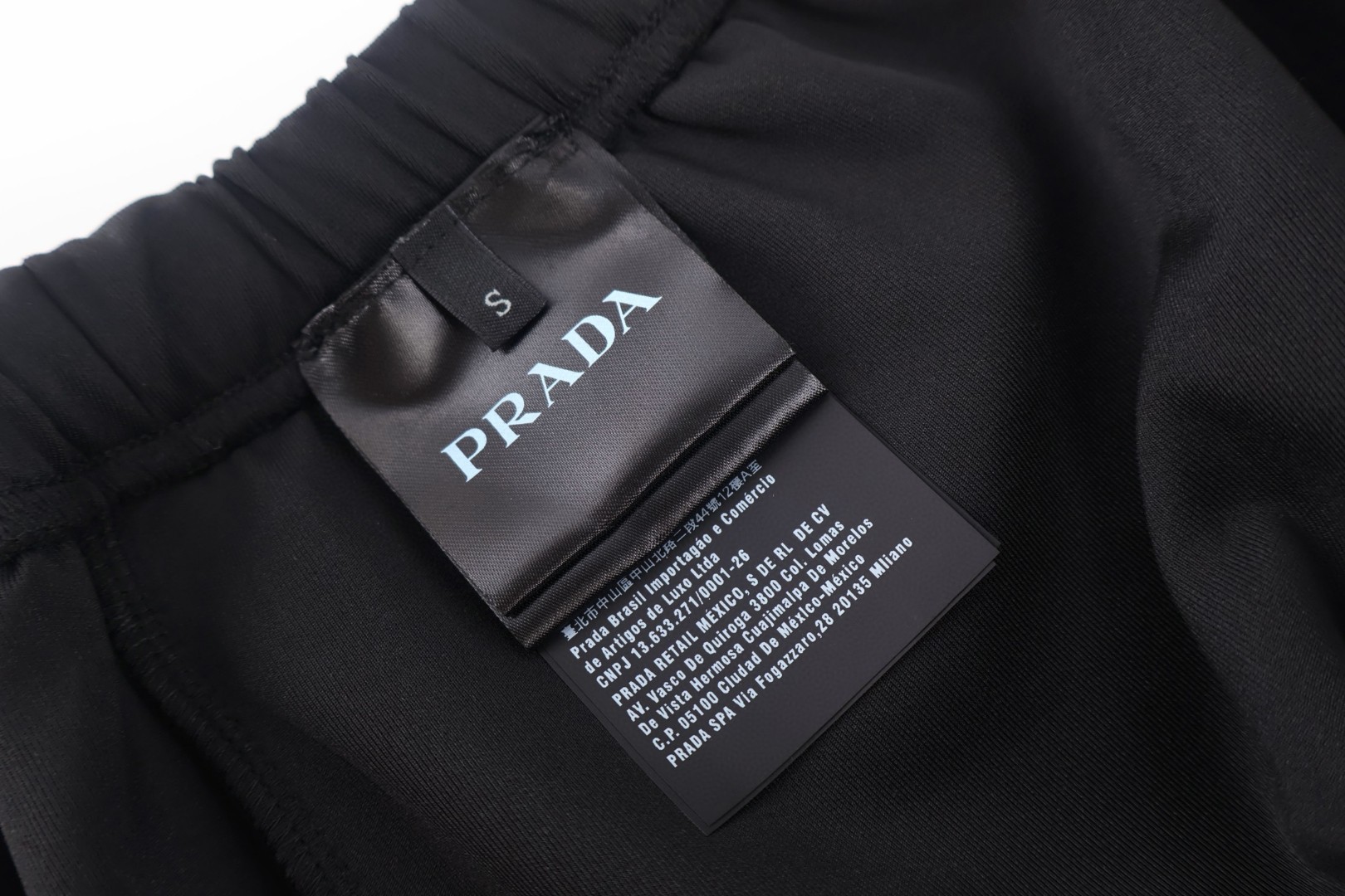 PRADA 普拉达 小logo刺绣松紧腰运动裤 休闲裤 裤子 长裤 黑色 B0