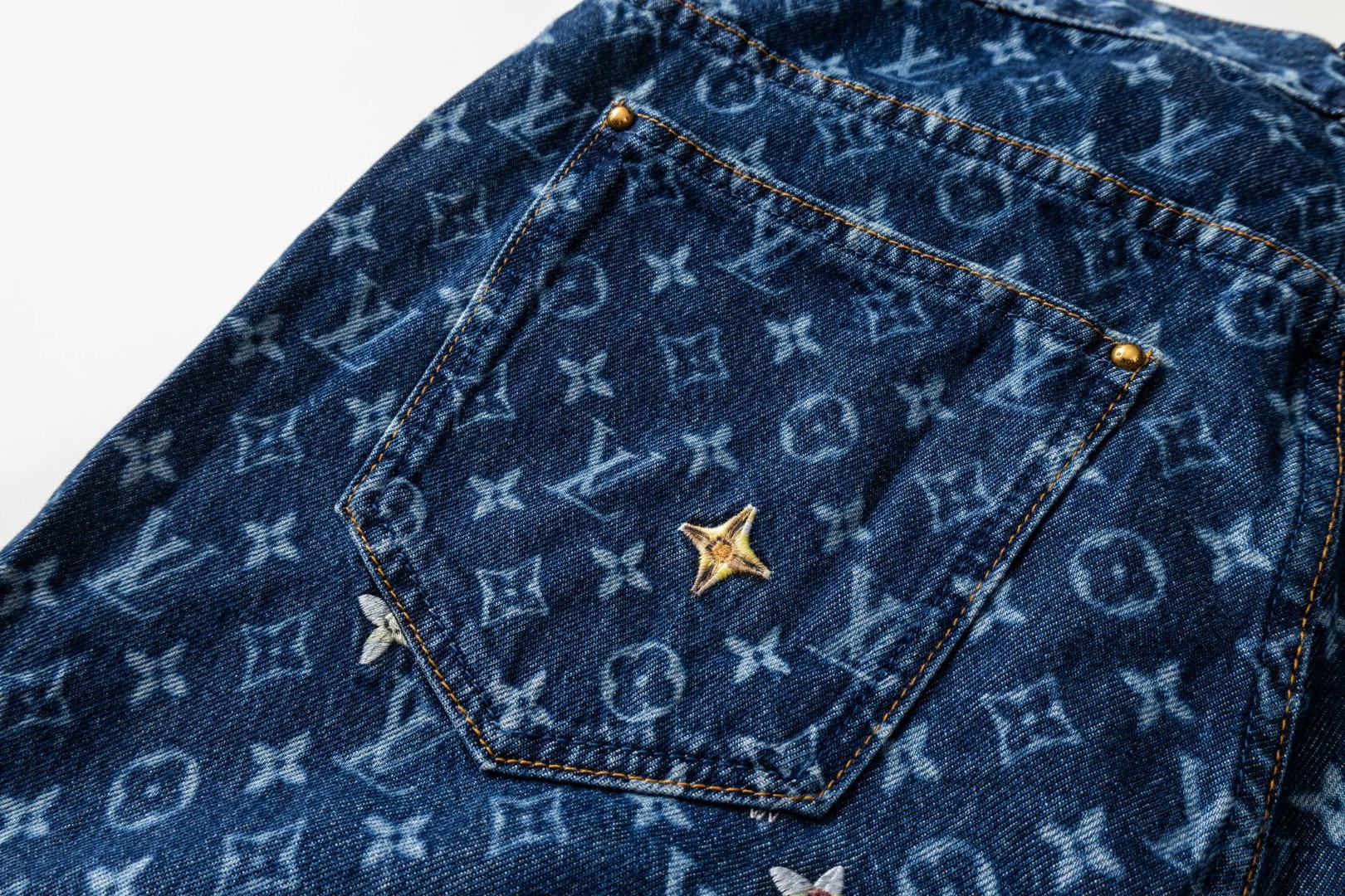 LOUIS VUITTON 路易威登 满印雏菊刺绣牛仔裤 休闲裤 长裤 裤子 蓝色 C5 1AJRNF