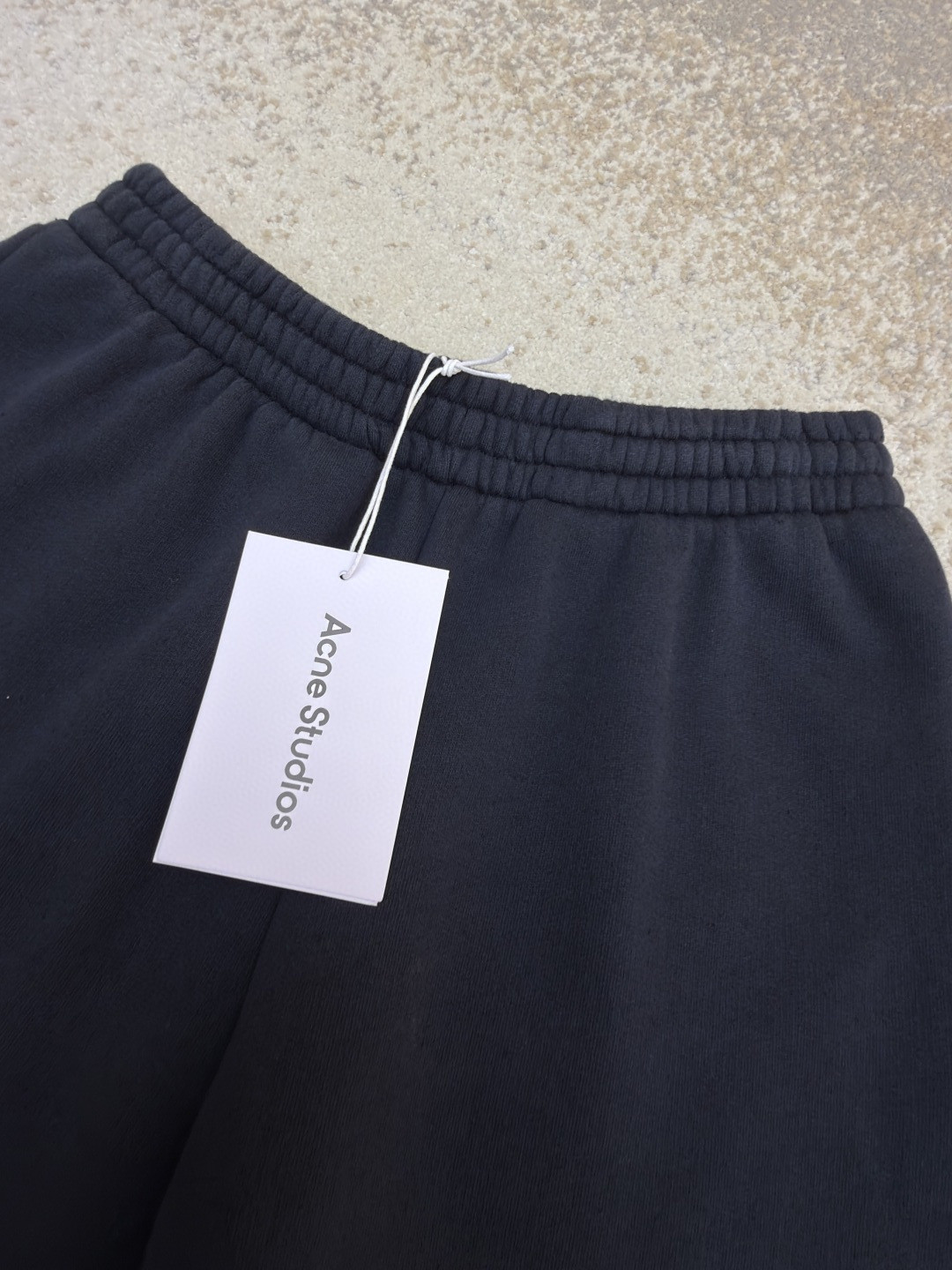 Acne Studios 1996后袋印花水洗运动裤 卫裤 休闲裤 长裤 裤子 黑色 A7