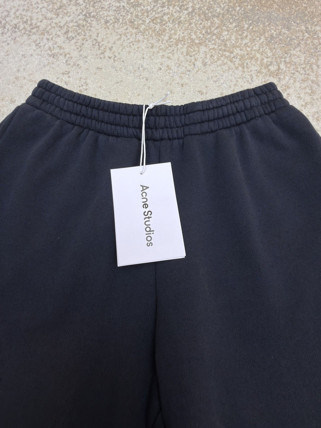 Acne Studios 1996后袋印花水洗运动裤 卫裤 休闲裤 长裤 裤子 黑色 A7
