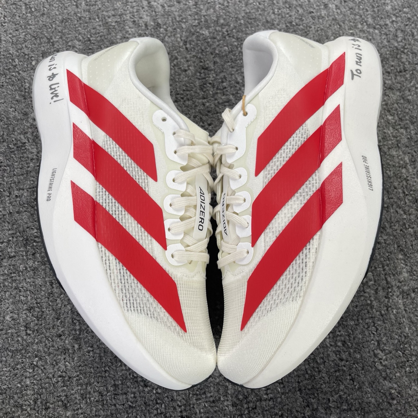 内置碳板 Adidas Adizero Evo SL 低筒 舒适百搭 防滑耐磨 马拉松 训练竞速 跑步鞋 女款 男款 波鞋 白红 JS1182