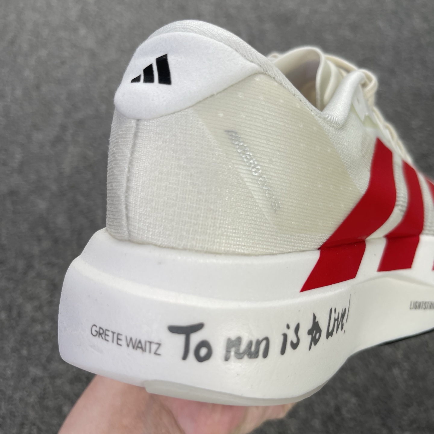 内置碳板 Adidas Adizero Evo SL 低筒 舒适百搭 防滑耐磨 马拉松 训练竞速 跑步鞋 女款 男款 波鞋 白红 JS1182