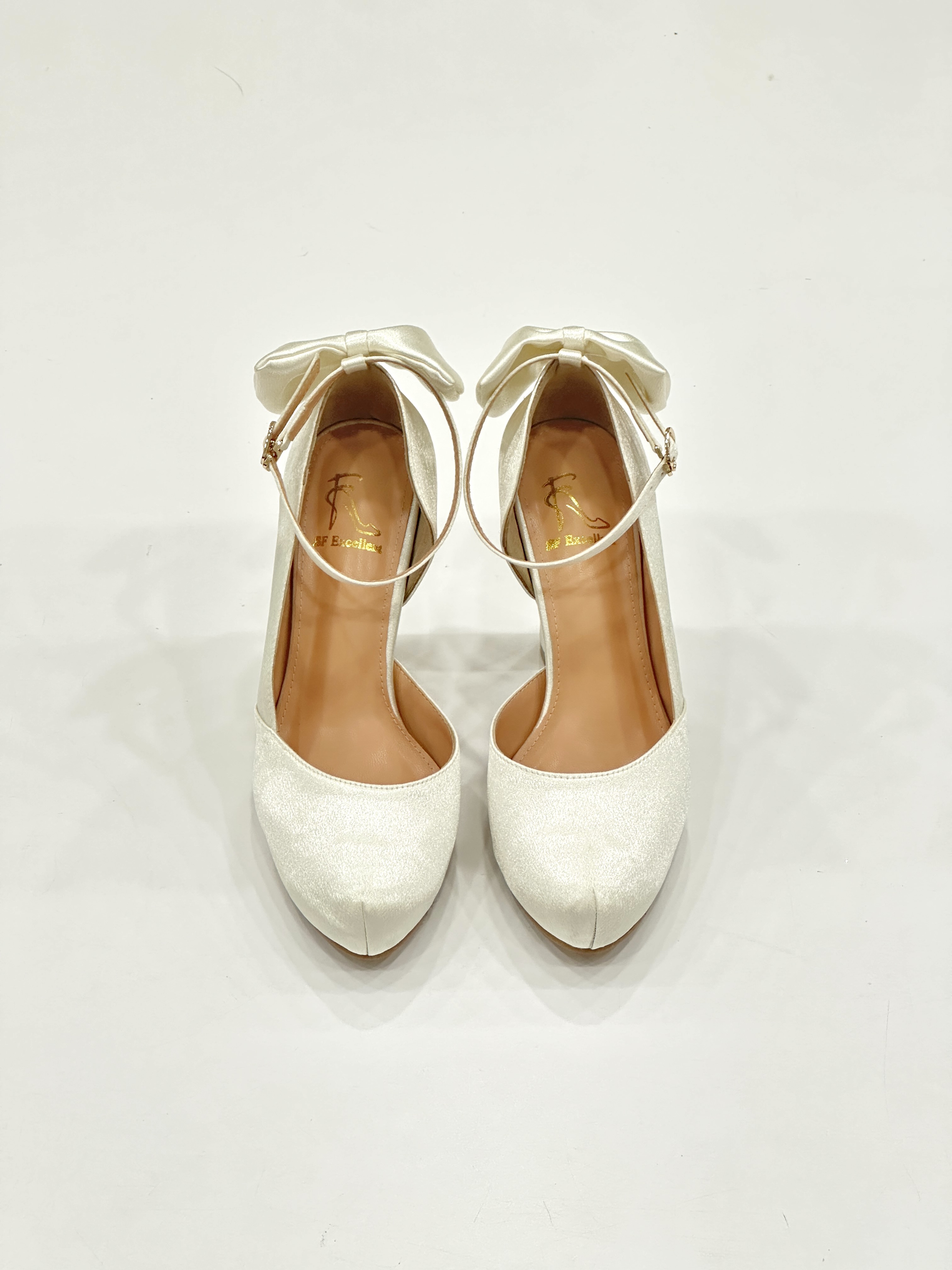 Emery Half D’Orsay Platform Pumps