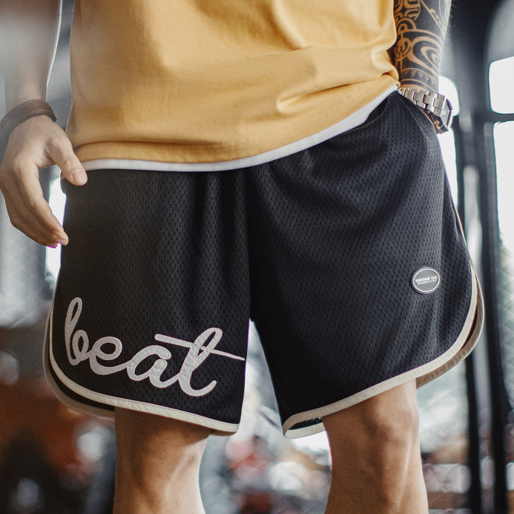 美式黑色雙層網眼短褲籃球高街運動風透氣沙灘四分褲男夏