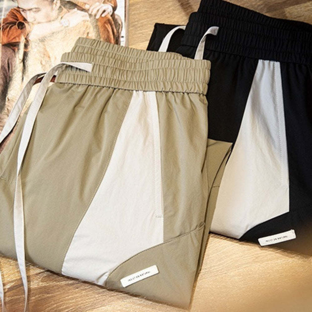 美式拼接工裝束脚休閒褲男春夏2025新款撞色戶外速幹運動褲子薄款