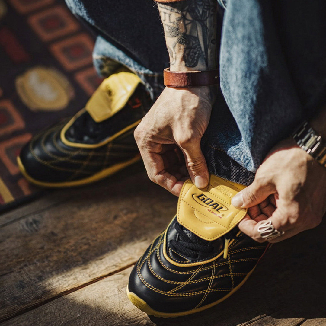 復古足球德訓鞋男春季新款翻蓋皮面黑黃色鞋子平底運動休閒鞋