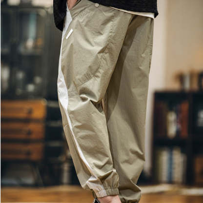 美式拼接工裝束脚休閒褲男春夏2025新款撞色戶外速幹運動褲子薄款