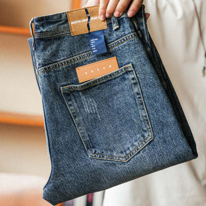 美式復古12.8盎司水洗藍牛仔褲男猫須磨破寬鬆直筒休閒長褲-Retro's Wear