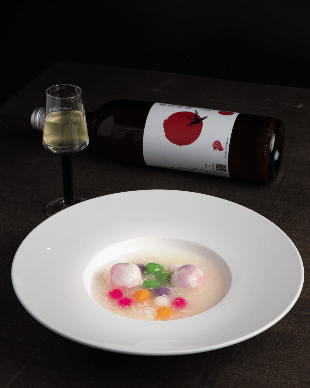 Winter solstice, tang yuan, glutinous rice balls with Hakka wine and rice lees, Hakka dessert. 酒酿丸子，酒糟，冬至汤圆。