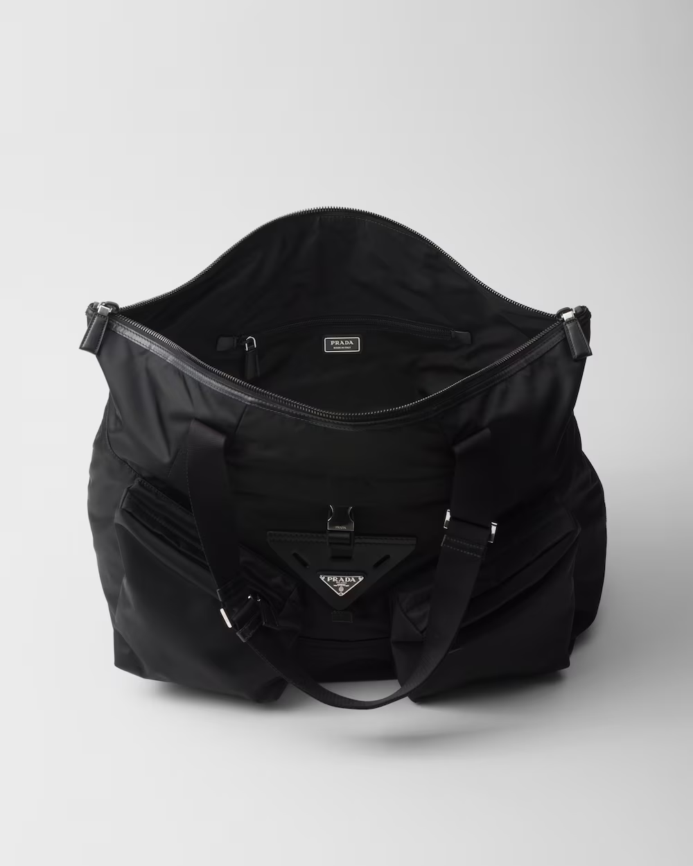 Re-Nylon and leather travel bag