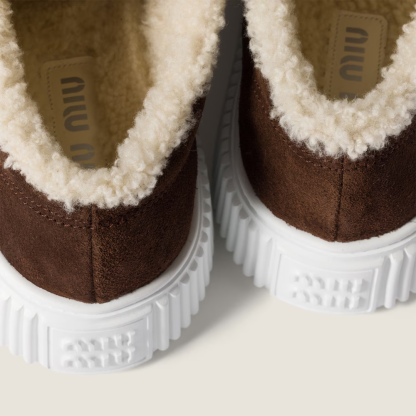 Suede and shearling sneakers