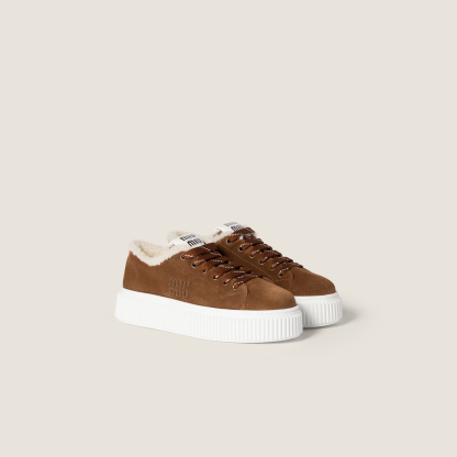Suede and shearling sneakers