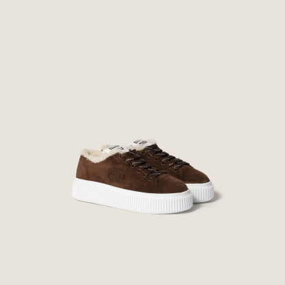Suede and shearling sneakers