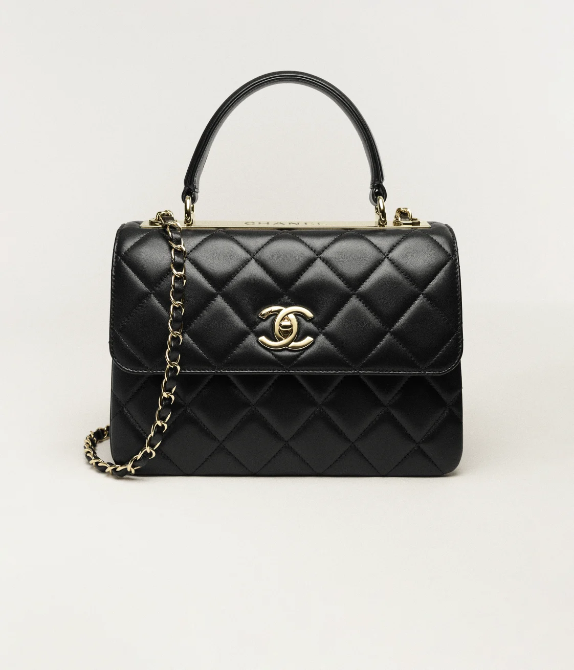 FLAP BAG WITH TOP HANDLE